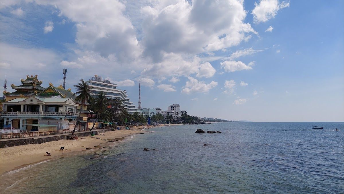 Duong Dong town waterfront with the Dinh Cau temple and resort buildings lining the shore