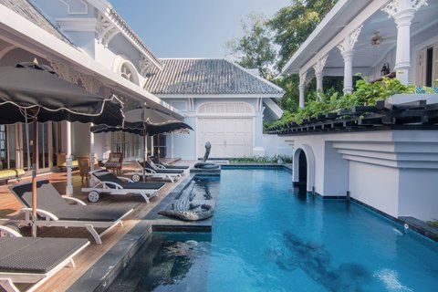 The JW Marriott's pool area at Emerald Bay — the resort sits on its own sheltered Bai Khem cove JW Marriott Phu Quoc Emerald Bay pool with Bai Khem's white sand beach beyond