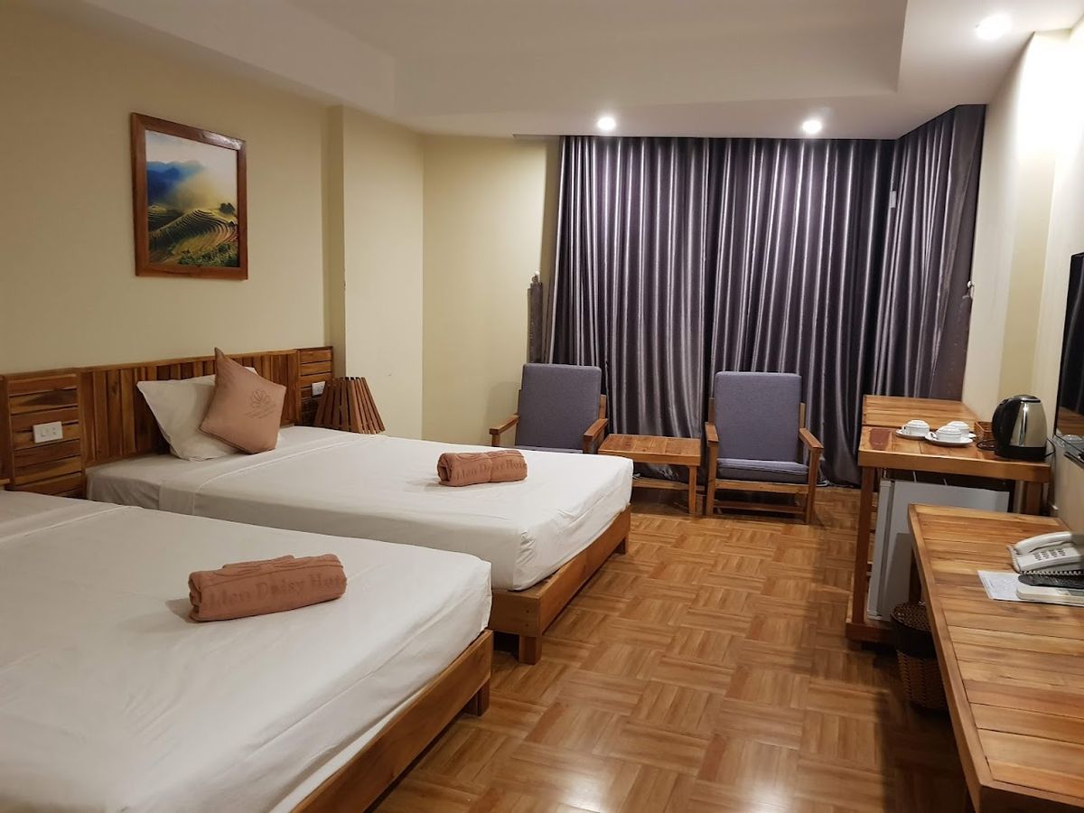 Golden Daisy Hotel pool and grounds in Duong Dong