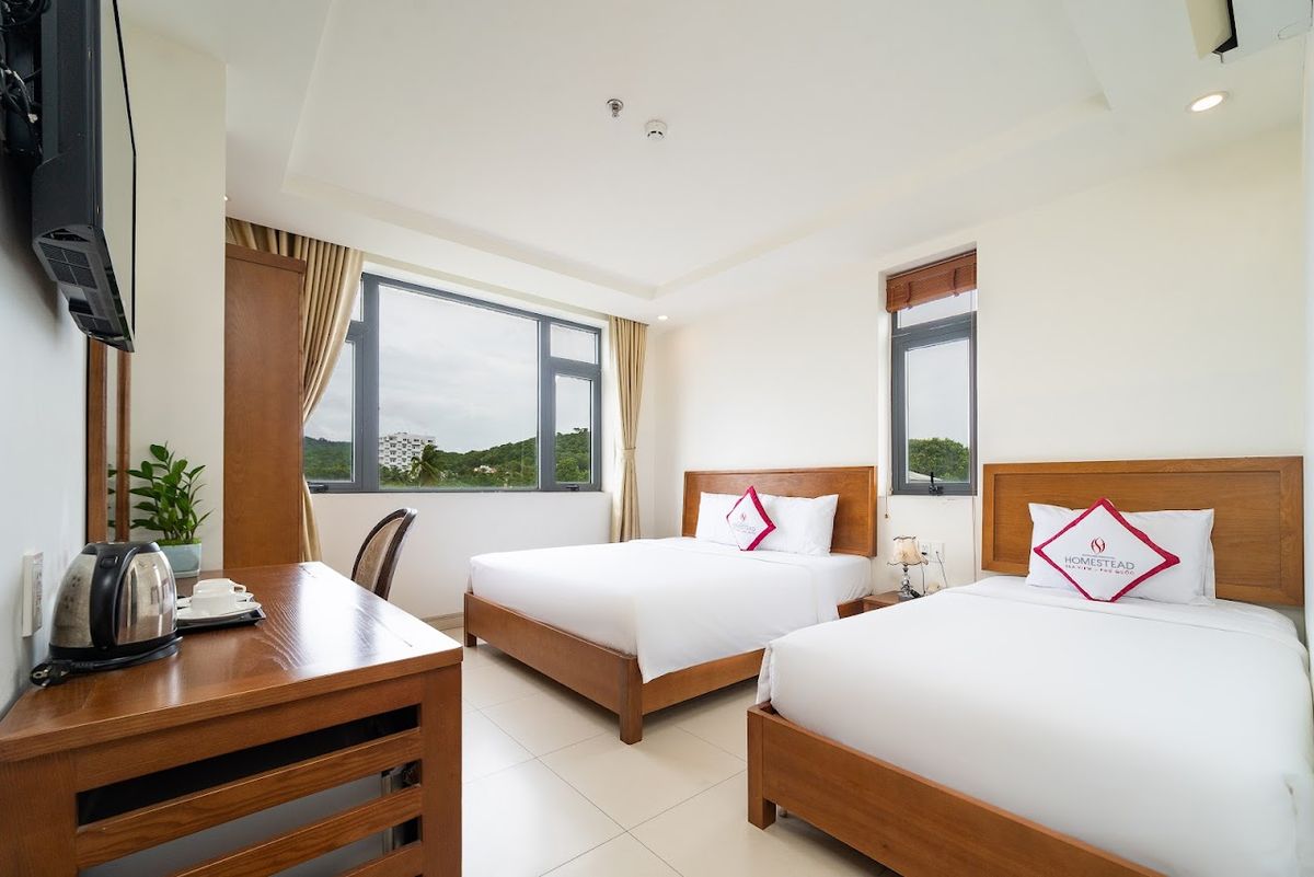 Homestead Seaview Phu Quoc Hotel pool and grounds in Long Beach