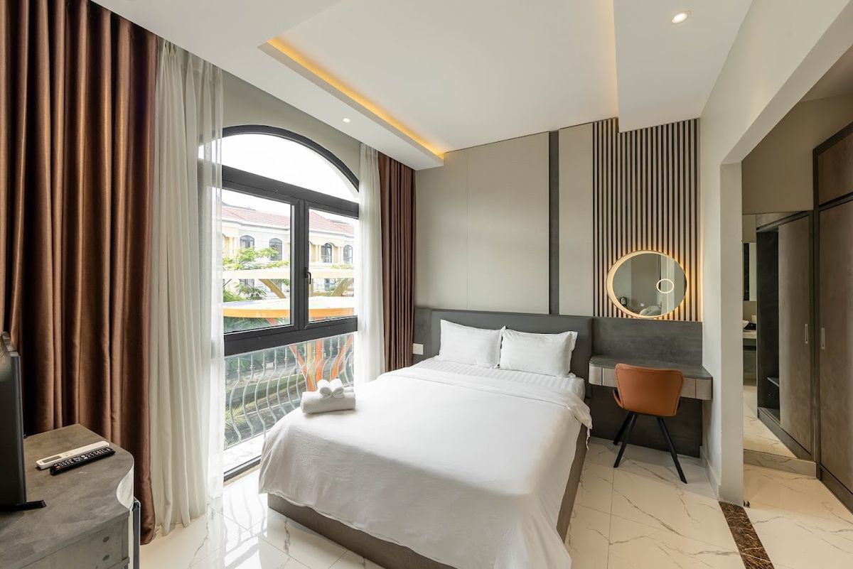 RAINBOW Motel Grand World Phú Quốc pool and grounds in Ganh Dau