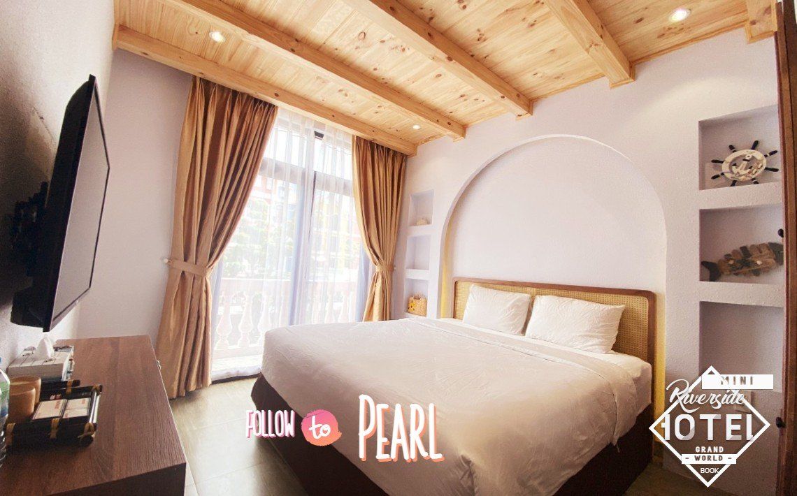 Riverside Mini Hotel Grand World Phú Quốc pool and grounds in Ganh Dau